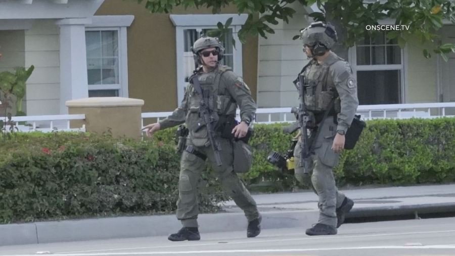 SWAT Team members surrounded an Anaheim senior apartment complex after a woman was shot to death on April 25, 2024. (OnScene.TV)