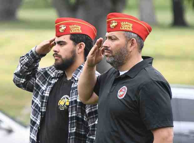 Veterans stand and salute during its 17th annual Memorial Day...