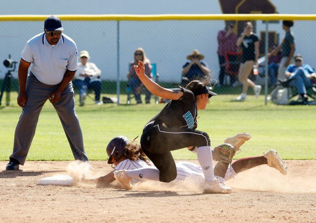 Providence’s Delailah Lopez tries to tag out Valley Christians Choyce...