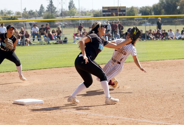 Valley Christian’s Choyce Chambers slides to third behind Providences Malia...