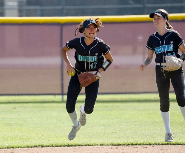 Providence’s Breanna Pelaez comes up with a big out as...