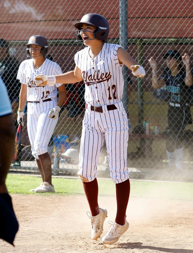 Valley Christian’s Rachel Zhang scores for the Defenders as they...