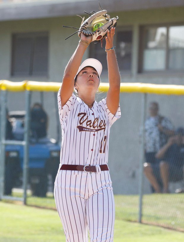 Valley Christian’s Kayla Martin grabs the out as they take...