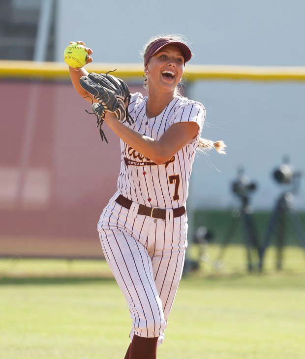 Valley Christian’s Britton Brown smiles after making a huge out...