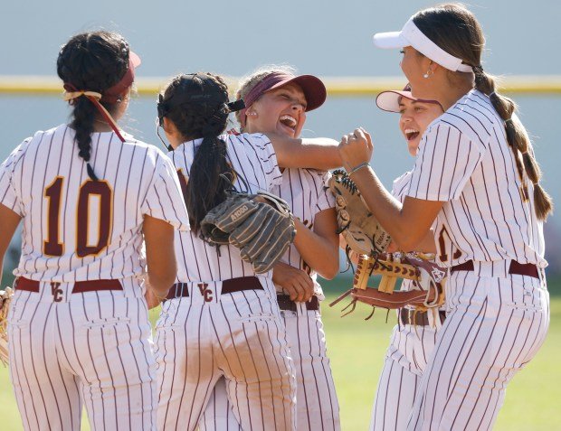 Valley Christian’s Britton Brown celebrates with her team after a...