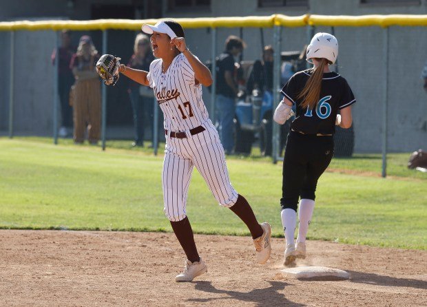 Valley Christian’s Kayla Martin closes out the game with an...