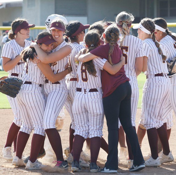 Valley Christian softball celebrates their big win in the CIF-SS...