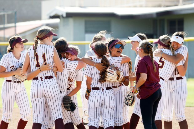 Valley Christian softball celebrates their big win in the CIF-SS...