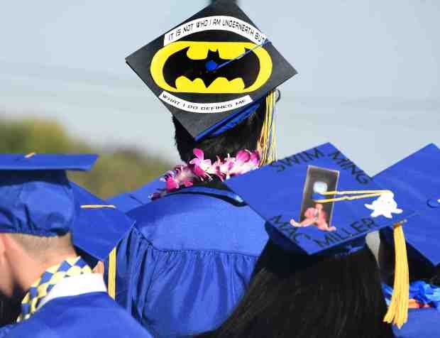 Grad sends the bat signal on his cap during the...