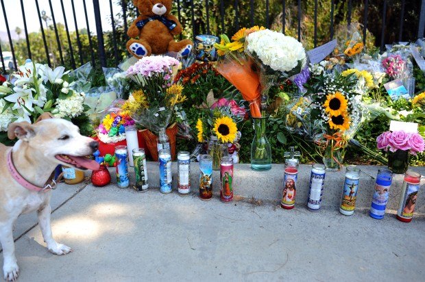 A memorial is growing for Mark and Jacob Iskander who...