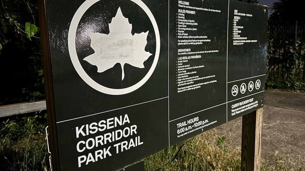 Park signage at the entrance to the trail