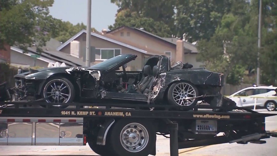Zach Henn's Corvette being towed away from the crash site in Placentia on June 4, 2024. (KTLA)