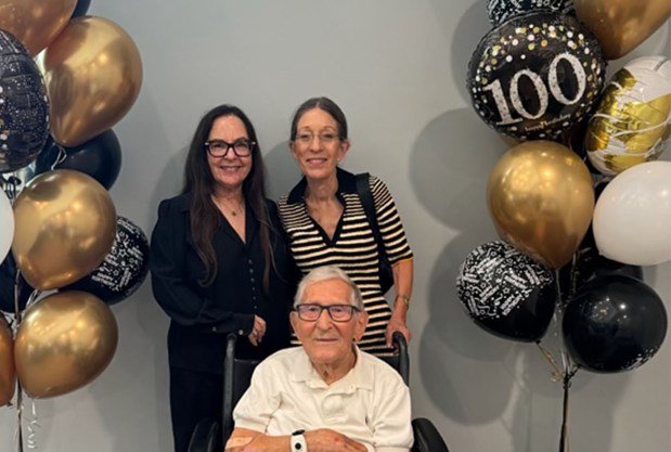 Morris Savich and his two daughters Linda Alper and Leslee...