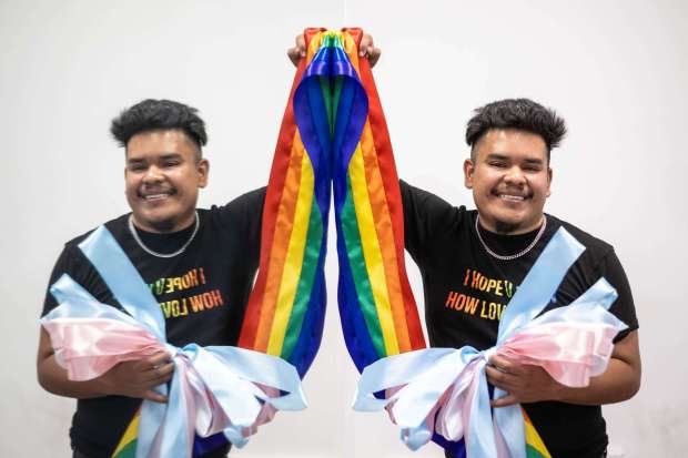 President and cofounder Kevin Perez, of the nonprofit Somos Familia Valle, poses on Tuesday, July 2, 2024 with ribbon from the LGBTQ+ center's recent ribbon cutting in a Sun Valley mini mall (Photo by Sarah Reingewirtz, Los Angeles Daily News/SCNG)