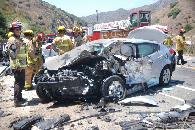 Los Angeles firefighters are at the scene of a two-vehicle crash Thursday, July 18, 2024, on the 8400 block of West La Tuna Canyon Road in the Tujunga area that left one person dead at the scene and another in serious condition. (Photo by Mike Meadows/Contributing Photographer)