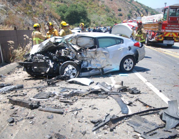 Los Angeles firefighters are at the scene of a two-vehicle crash Thursday, July 18, 2024, on the 8400 block of West La Tuna Canyon Road in the Tujunga area that left one person dead at the scene and another in serious condition. (Photo by Mike Meadows/Contributing Photographer)