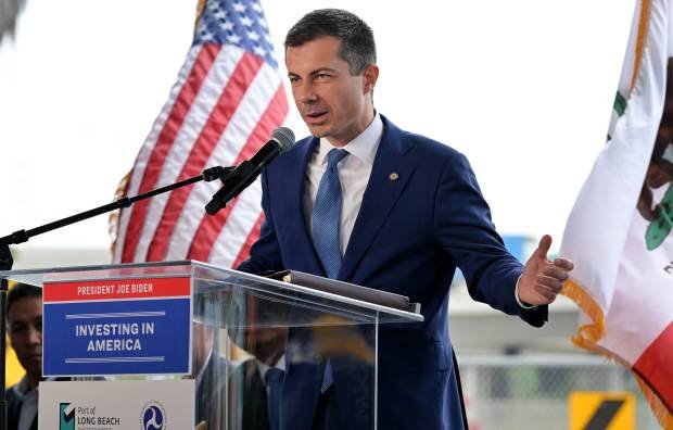 U.S. Secretary of Transportation Pete Buttigieg, speaks as officials gathered...