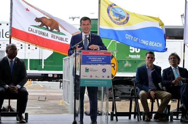 U.S. Secretary of Transportation Pete Buttigieg, speaks as officials gathered...