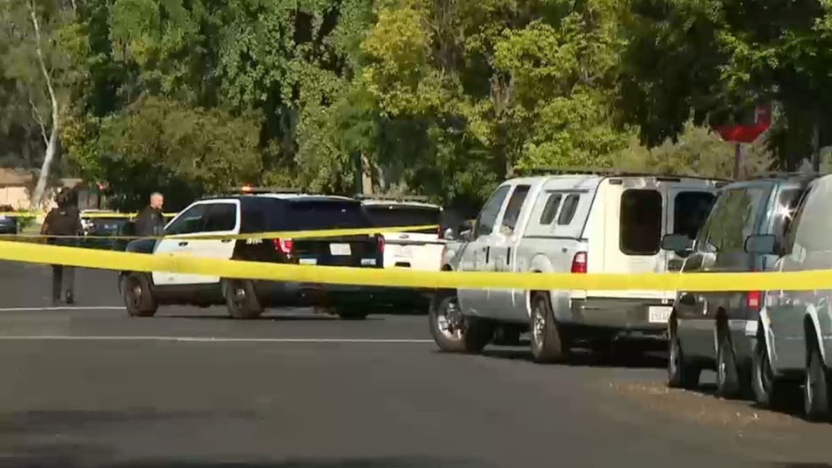 Police at the scene of a home invasion