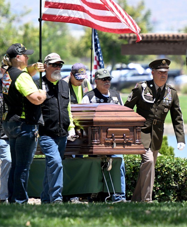 Members of the Patriot Guard carry the casket of U.S....