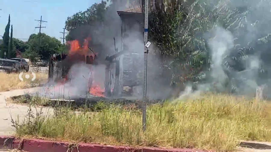 Video from the Citizen app shows firefighters responding to a fire burning at a vacant home in North Hollywood on July 19, 2024.