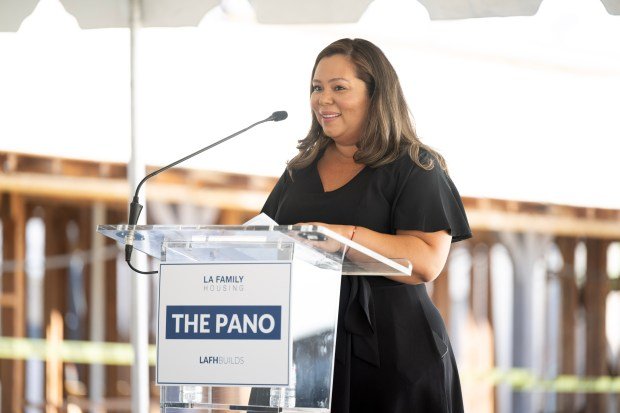 Elda Mendez-Lemus, LAFHBUILDS, speaks during a groundbreaking ceremony for The...