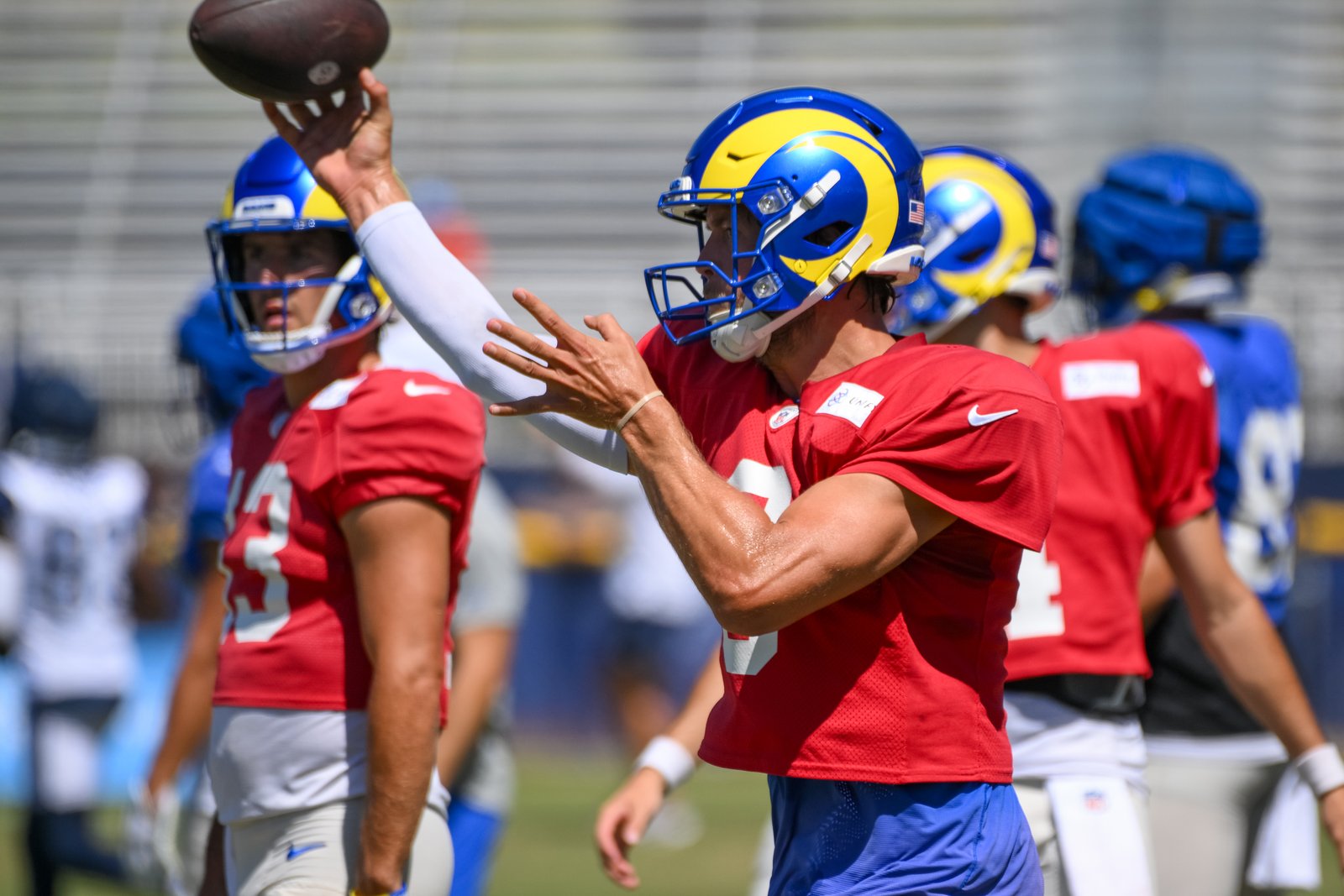 Rams quarterback Matthew Stafford passes during a joint practice with...