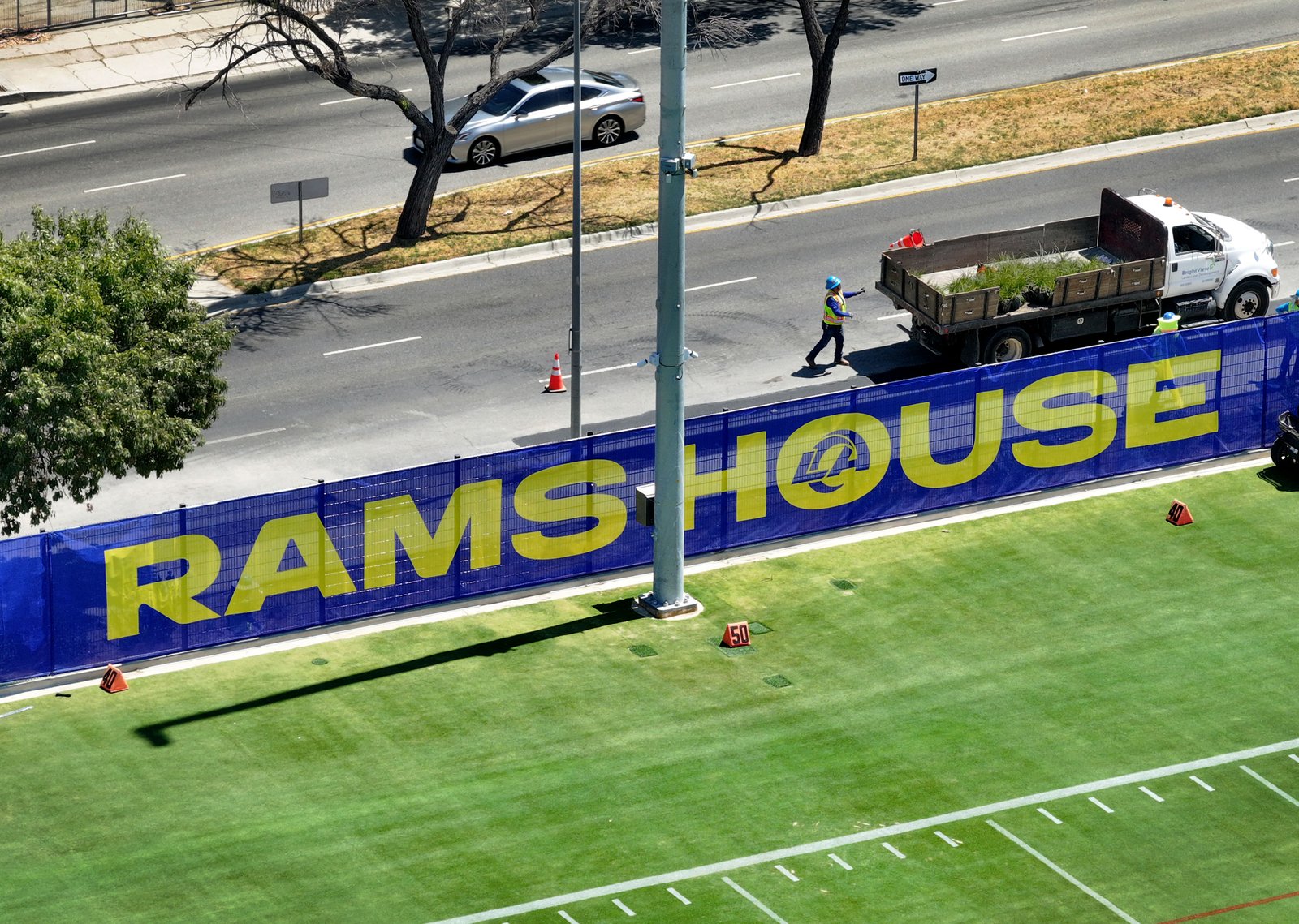 A landscape worker at the new Los Angeles Rams training...