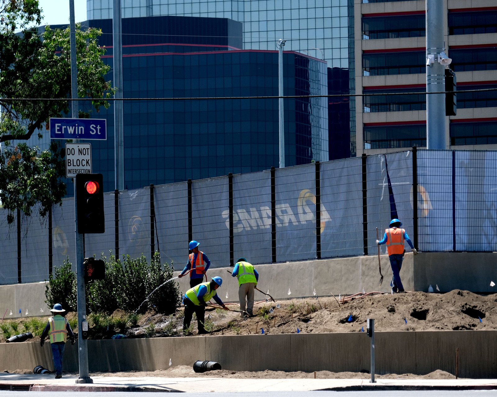 Landscape workers at the new Los Angeles Rams training facility...