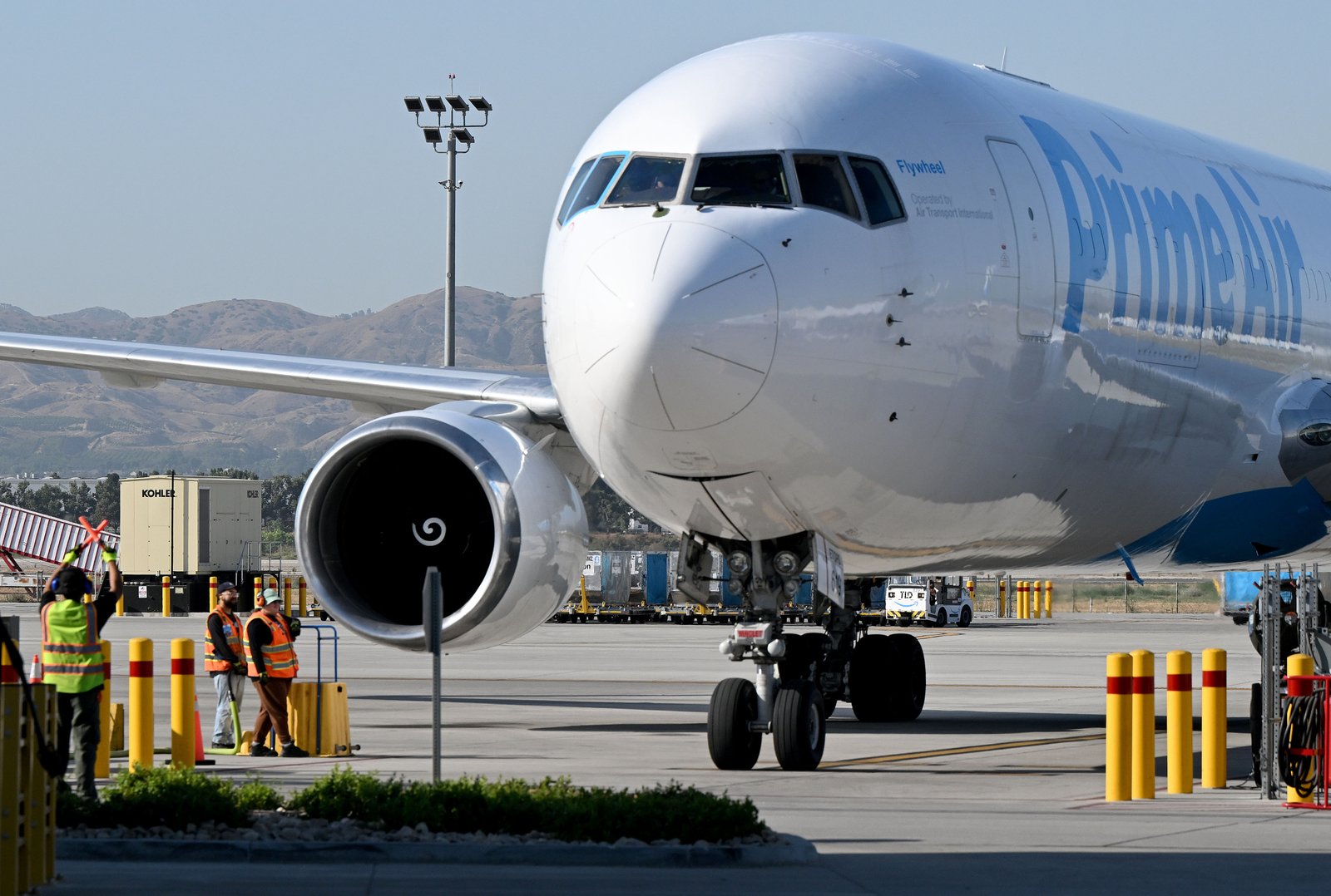 An Amazon Prime Air Boeing 767 arrives at Amazon’s air...