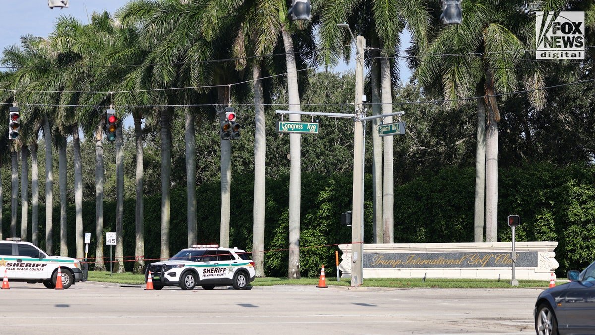 Members of the Palm Beach County Sheriff’s Department patrols outside of Trump International Golf Club