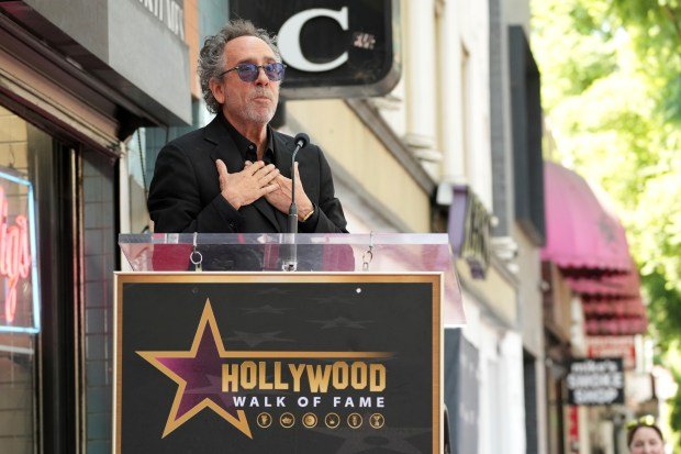 Tim Burton arrives at a ceremony honoring him with a...