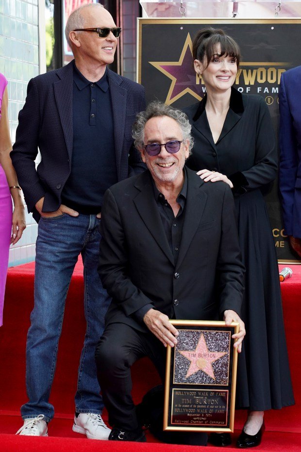 Michael Keaton, from left, Tim Burton, and Winona Ryder arrive...