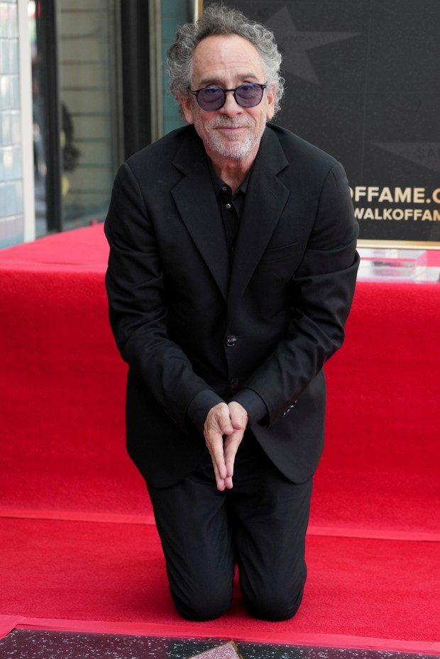 Tim Burton arrives at a ceremony honoring him with a...