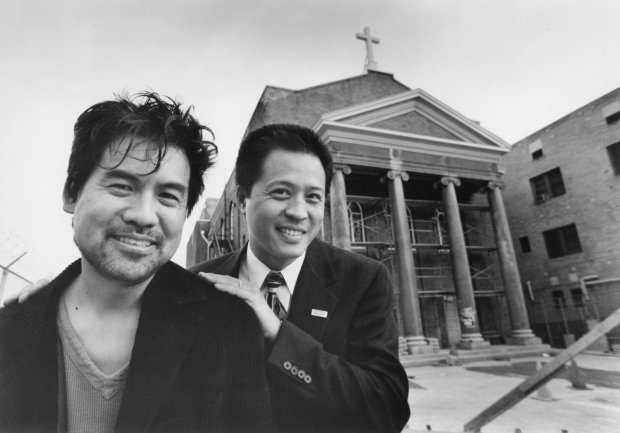 David Henry Hwang (left) & Tim Dang (right) in front of the Union Center, mid-renovation. (Courtesy of East West Players)