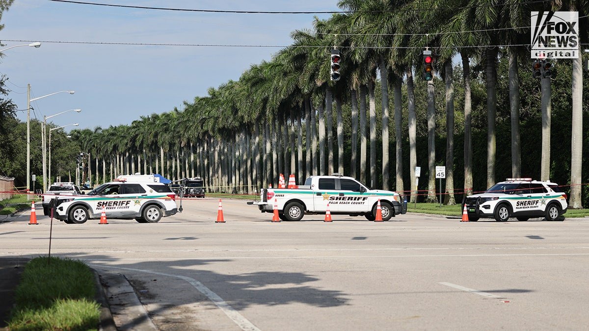 Members of the Palm Beach County Sheriff’s Department patrols outside of Trump International Golf Club