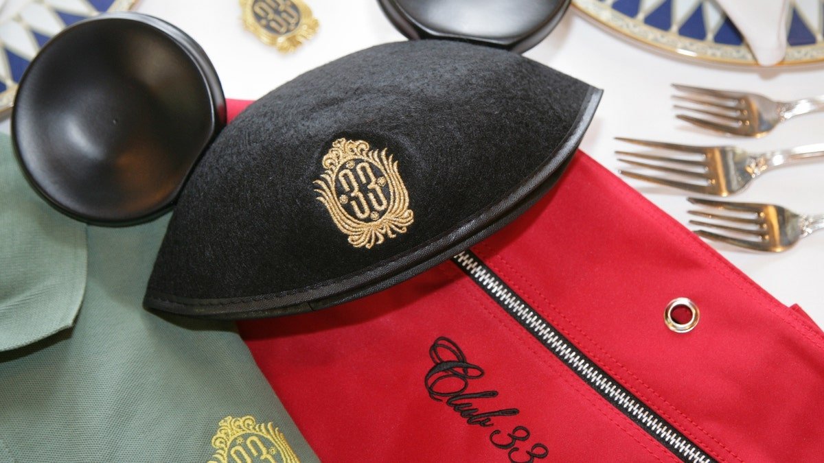 A Club 33 Mickey Mouse hat on a table