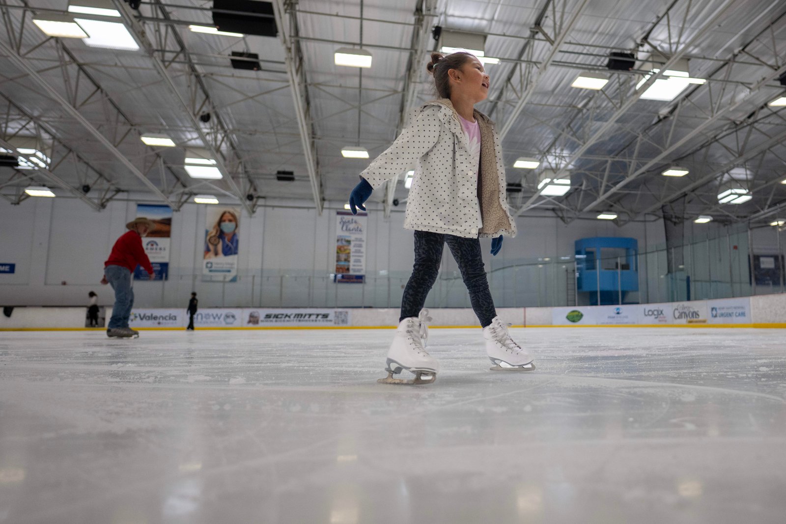 People beat the heat while ice skating at The Cube...