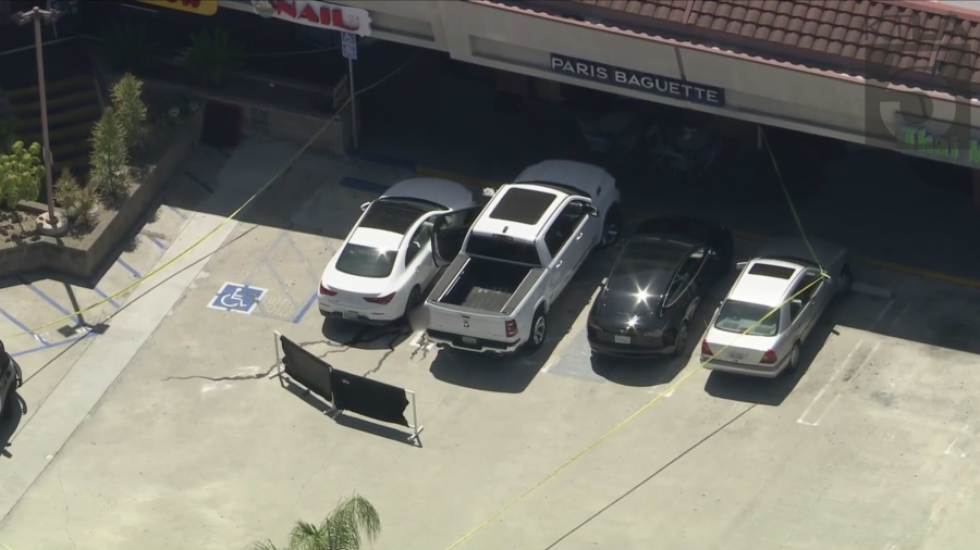 The victim was found lying on the ground next to his white pickup truck at a Glendale parking lot on August 15, 2024. (KTLA)