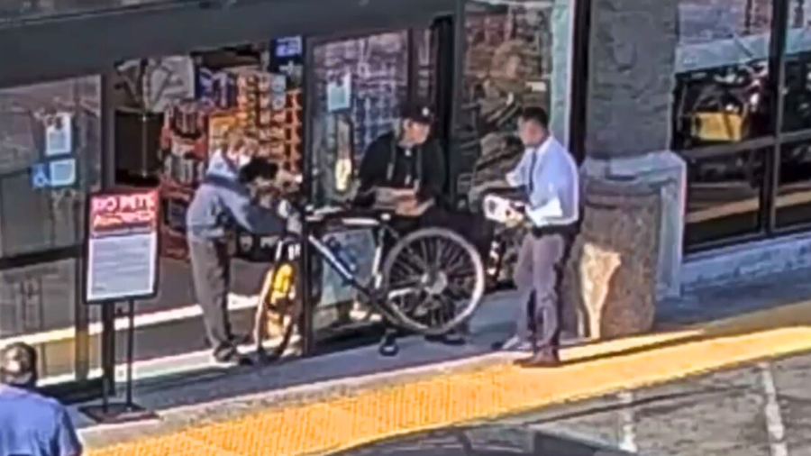 Security cameras captured the female suspect punching the store's assistant manager when she was confronted for stealing on August 26, 2024. (Santa Ana Police Department)